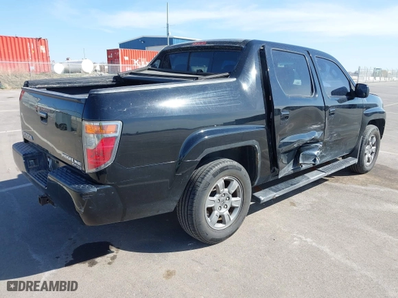 2007 Honda Ridgeline RTX with VIN 2HJYK16377H515373, listed as a IAAI auction lot 41912195 with 200,683 mi miles. Bid and sale history available at carsss.com. Image 4.
