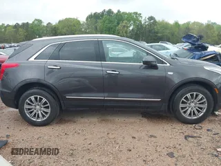 2019 Cadillac XT5 Luxury AWD z VIN 1GYKNDRS6KZ113420, wystawiony jako IAAI lot #41951065 z przebiegiem 56 360 mil mil oraz . Historia ofert i sprzedaży dostępna na DreamBid. Obrazek 13.