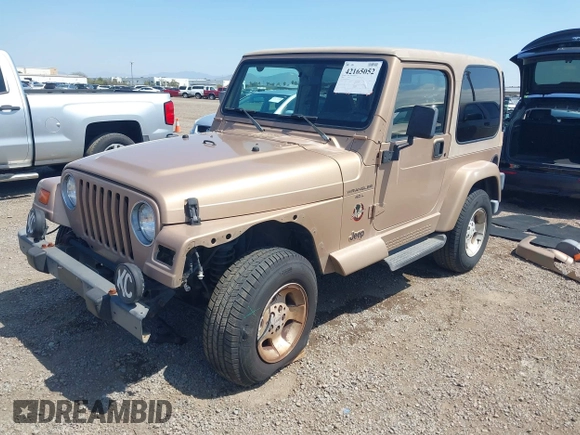 1999 Jeep Wrangler Sahara with VIN 1J4FY49S8XP462512, listed as a IAAI auction lot 42165052 with 146,135 mi miles and . Bid and sale history available at DreamBid. Image 2.