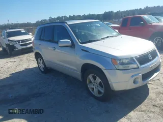 2007 Suzuki Grand Vitara Luxury z VIN JS3TD947074204900, wystawiony jako IAAI lot #41488003 z przebiegiem 187 502 mil mil oraz . Historia ofert i sprzedaży dostępna na DreamBid. Obrazek 1.