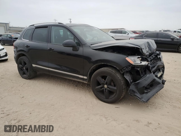 2013 Volkswagen Touareg Lux with VIN WVGEF9BP7DD005872, listed as a Copart auction lot 82618654 with 236,650 mi miles and Salvage Title. Bid and sale history available at DreamBid. Image 4.