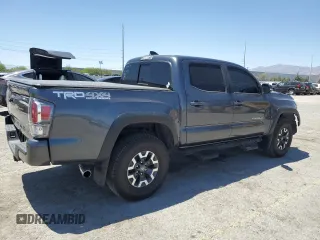 2022 Toyota Tacoma SR with VIN 3TMCZ5AN5NM482575, listed as a Copart auction lot 61498025 with 49,046 mi miles and Salvage title. Bid and sale history available at DreamBid. Image 3.
