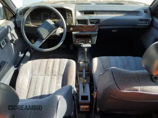 1987 Toyota Corolla с VIN JT2AE82E4H3494699, выставлен на аукционе Copart как лот 66815714 с пробегом 145 679 миль миль и Списание • Salvage title. История ставок и продаж доступна на DreamBid. Изображение 8.