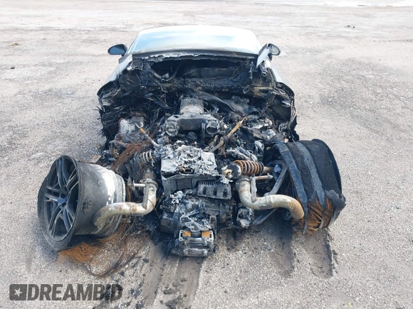 2021 Audi R8 z VIN WUAKBAFX5M7900468, wystawiony jako IAAI lot #41214857 z przebiegiem Nie podano mil oraz . Historia ofert i sprzedaży dostępna na DreamBid. Obrazek 13.