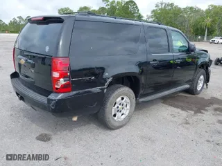2014 Chevrolet Suburban LT with VIN 1GNSKJE73ER130976, listed as a IAAI auction lot 42016692 with 73,263 mi miles. Bid and sale history available at carsss.com. Image 4.