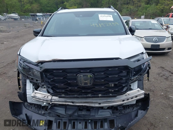 2023 Honda Passport Elite with VIN 5FNYF8H00PB022743, listed as a IAAI auction lot 42192958 with 25,165 mi miles and . Bid and sale history available at DreamBid. Image 12.