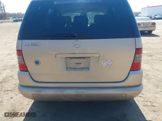 2001 Mercedes-Benz M-Class with VIN 4JGAB54E91A251754, listed as a IAAI auction lot 41784883 with 148,288 mi miles. Bid and sale history available at carsss.com. Image 6.