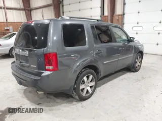 2012 Honda Pilot Touring with VIN 5FNYF4H99CB052034, listed as a IAAI auction lot 42023430 with 137,428 mi miles. Bid and sale history available at carsss.com. Image 4.
