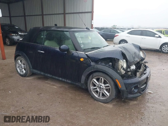 2013 MINI Convertible with VIN WMWZN3C53DT135492, listed as a IAAI auction lot 41436703 with 79,408 mi miles and . Bid and sale history available at DreamBid. Image 1.