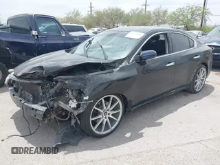 2012 Nissan Maxima S with VIN 1N4AA5AP1CC819585, listed as a IAAI auction lot 42244364 with 180,488 mi miles and . Bid and sale history available at DreamBid. Image 2.