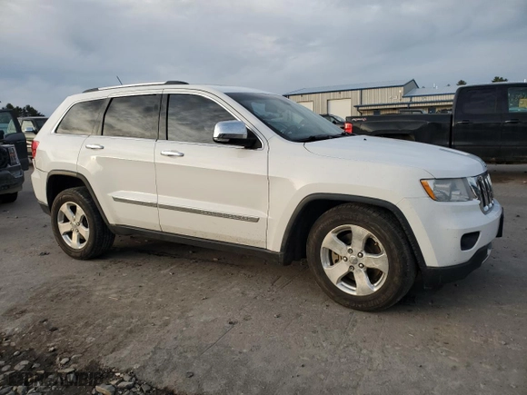 2013 Jeep Grand Cherokee Limited with VIN 1C4RJFBT7DC575652, listed as a Copart auction lot 53027615 with 183,348 mi miles and Non Repairable. Bid and sale history available at carsss.com. Image 4.