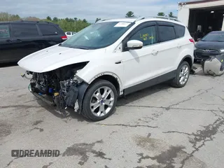 2016 Ford Escape Titanium with VIN 1FMCU9J98GUA00832, listed as a IAAI auction lot 42188941 with 90,764 mi miles and . Bid and sale history available at DreamBid. Image 17.
