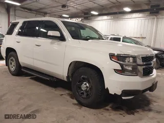 2015 Chevrolet Tahoe Commercial with VIN 1GNSK2EC5FR688820, listed as a IAAI auction lot 41444813 with 206,244 mi miles. Bid and sale history available at carsss.com. Image 1.