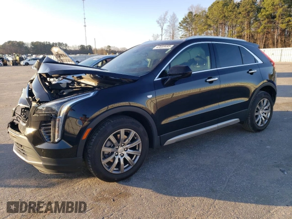 2020 Cadillac XT4 FWD Premium Luxury z VIN 1GYFZCR44LF056476, wystawiony jako Copart lot #43559495 z przebiegiem 51 076 mil mil oraz Szkody całkowita. Historia ofert i sprzedaży dostępna na DreamBid. Obrazek 1.