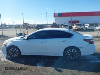 2018 Nissan Altima S with VIN 1N4AL3AP9JC181033, listed as a IAAI auction lot 41400570 with 198,928 mi miles and . Bid and sale history available at carsss.com. Image 14.
