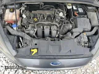 2017 Ford Focus Titanium z VIN 1FADP3N22HL307260, wystawiony jako Copart lot #61399785 z przebiegiem 103 293 mil mil oraz Szkoda całkowita • Salvage title. Historia ofert i sprzedaży dostępna na DreamBid. Obrazek 11.