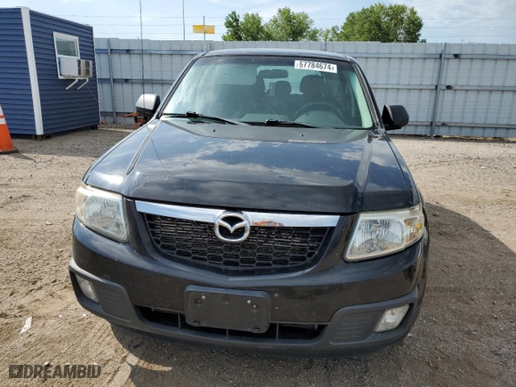 2010 Mazda Tribute Touring with VIN 4F2CY9C75AKM02945, listed as a Copart auction lot 67784674 with 134,363 mi miles and Salvage Title. Bid and sale history available at carsss.com. Image 5.