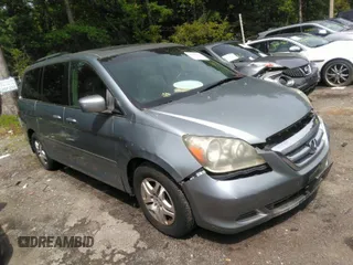 2006 Honda Odyssey EX-L with VIN 5FNRL38706B107724, listed as a IAAI auction lot 39245592 with 186,885 mi miles. Bid and sale history available at carsss.com. Image 1.