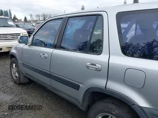 1998 Honda CR-V EX z VIN JHLRD1863WC052453, wystawiony jako IAAI lot #41514197 z przebiegiem 213 487 mil mil oraz . Historia ofert i sprzedaży dostępna na DreamBid. Obrazek 14.