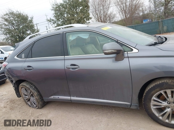 2013 Lexus RX 450h with VIN JTJBC1BA0D2440528, listed as a IAAI auction lot 41591177 with 156,869 mi miles and . Bid and sale history available at DreamBid. Image 13.