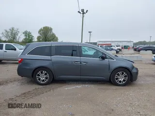 2013 Honda Odyssey EX z VIN 5FNRL5H47DB032096, wystawiony jako IAAI lot #42149190 z przebiegiem 149 836 mil mil oraz . Historia ofert i sprzedaży dostępna na DreamBid. Obrazek 13.