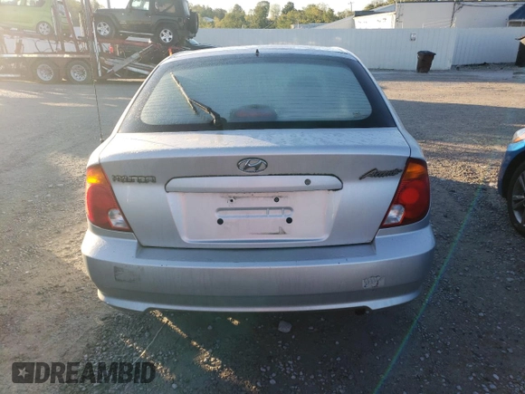2004 Hyundai Accent GL with VIN KMHCG35C44U284868, listed as a Copart auction lot 74054884 with 87,259 mi miles and Clean Title. Bid and sale history available at carsss.com. Image 6.