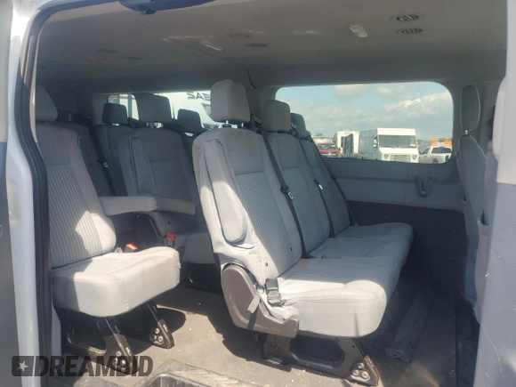 2018 Ford Transit Passenger XL z VIN 1FBZX2ZM8JKB02466, wystawiony jako Copart lot #55098365 z przebiegiem 166 367 mil mil oraz Szkoda całkowita • Salvage title. Historia ofert i sprzedaży dostępna na DreamBid. Obrazek 11.
