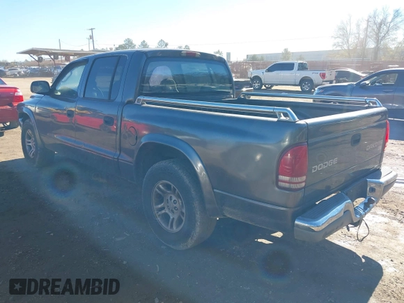 2003 Dodge Dakota SLT with VIN 1D7HL48X03S174569, listed as a IAAI auction lot 41159169 with 156,551 mi miles. Bid and sale history available at carsss.com. Image 3.