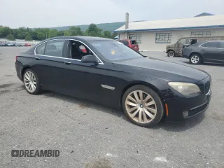 2012 BMW 7 Series with VIN WBAKX6C52CC197154, listed as a Copart auction lot 59897855 with 114,279 mi miles and Clean title. Bid and sale history available at DreamBid. Image 4.