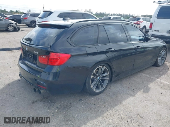 2014 BMW 3 Series 328i xDrive with VIN WBA3G7C57EKN37319, listed as a IAAI auction lot 41699235 with 93,671 mi miles and . Bid and sale history available at carsss.com. Image 4.