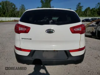2012 Kia Sportage LX with VIN KNDPBCA21C7233424, listed as a Copart auction lot 61829465 with 129,526 mi miles and Salvage title. Bid and sale history available at DreamBid. Image 6.