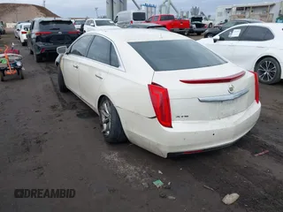 2013 Cadillac XTS with VIN 2G61N5S32D9114767, listed as a IAAI auction lot 41726593 with 70,572 mi miles. Bid and sale history available at carsss.com. Image 3.