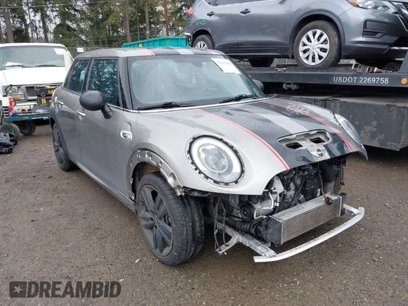 2017 MINI Hardtop 4 Door Cooper S z VIN WMWXU3C58H2D33073, wystawiony jako IAAI lot #41913081 z przebiegiem 51 631 mil mil oraz . Historia ofert i sprzedaży dostępna na DreamBid. Obrazek 1.
