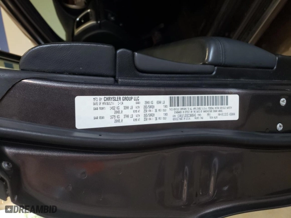 2014 Jeep Grand Cherokee Summit with VIN 1C4RJFJG5EC388545, listed as a Copart auction lot 68284754 with 189,897 mi miles and Salvage Title. Bid and sale history available at carsss.com. Image 14.
