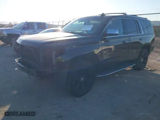 2016 Chevrolet Tahoe LTZ with VIN 1GNSKCKC1GR381785, listed as a IAAI auction lot 41376945 with 120,279 mi miles. Bid and sale history available at carsss.com. Image 2.