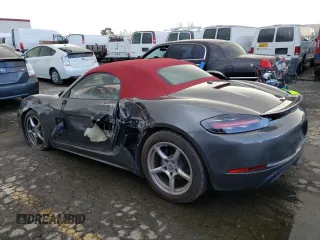 2018 Porsche 718 Boxster z VIN WP0CA2A86JS210697, wystawiony jako Copart lot #42892433 z przebiegiem 31 879 mil mil oraz . Historia ofert i sprzedaży dostępna na DreamBid. Obrazek 2.