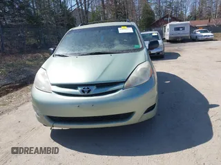 2009 Toyota Sienna CE with VIN 5TDZK23C29S233245, listed as a IAAI auction lot 42090217 with 340,012 mi miles. Bid and sale history available at carsss.com. Image 13.
