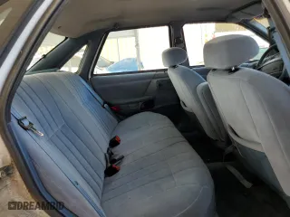 1992 Ford Taurus GL with VIN 1FALP52U5NA280821, listed as a Copart auction lot 77457304 with 33,484 mi miles and Salvage Title. Bid and sale history available at carsss.com. Image 10.