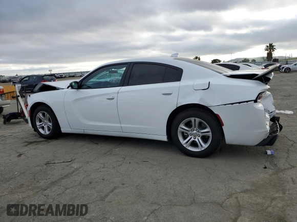 2023 Dodge Charger SXT with VIN 2C3CDXBG5PH703978, listed as a Copart auction lot 50657745 with 7,198 mi miles and Salvage Title. Bid and sale history available at carsss.com. Image 2.