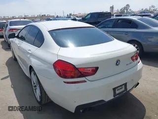 2015 BMW 6 Series 640i with VIN WBA6A0C56FD318007, listed as a IAAI auction lot 42041430 with 78,281 mi miles. Bid and sale history available at carsss.com. Image 3.