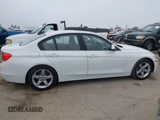 2014 BMW 3 Series 320i with VIN WBA3B1G58ENS80160, listed as a IAAI auction lot 42029951 with 97,306 mi miles. Bid and sale history available at carsss.com. Image 13.