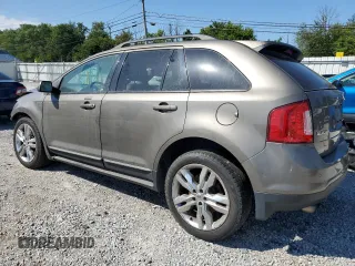 2014 Ford Edge SEL with VIN 2FMDK3J91EBA33648, listed as a Copart auction lot 63723214 with 0 mi miles and Salvage Title. Bid and sale history available at carsss.com. Image 2.
