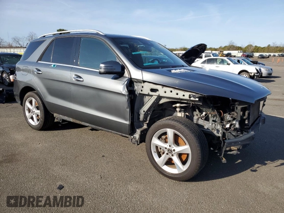 2019 Mercedes-Benz GLE 400 with VIN 4JGDA5GB4KB212891, listed as a Copart auction lot 51730735 with 77,710 mi miles and Salvage title. Bid and sale history available at DreamBid. Image 4.