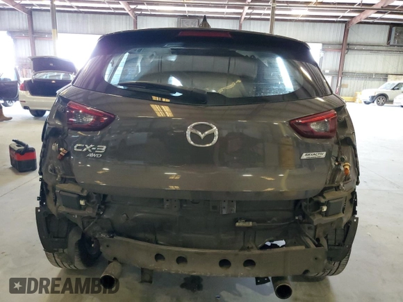 2017 Mazda CX-3 Grand Touring z VIN JM1DKFD74H0163736, wystawiony jako Copart lot #57871265 z przebiegiem 212 515 mil mil oraz Szkody całkowita. Historia ofert i sprzedaży dostępna na DreamBid. Obrazek 6.