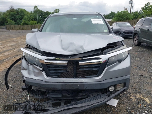2017 Honda Ridgeline RTL with VIN 5FPYK3F52HB019266, listed as a IAAI auction lot 42638081 with 117,004 mi miles and . Bid and sale history available at DreamBid. Image 12.