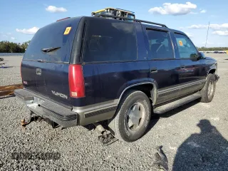 1998 GMC Yukon with VIN 1GKEK13R6WJ706204, listed as a Copart auction lot 77577074 with 186,023 mi miles and Salvage Title. Bid and sale history available at carsss.com. Image 3.