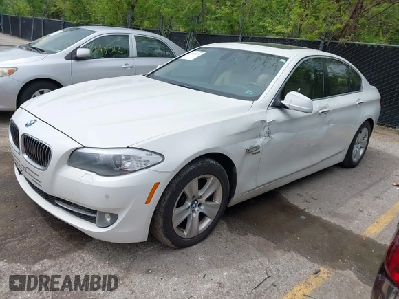 2012 BMW 5 Series 528i xDrive with VIN WBAXH5C58CDW11514, listed as a IAAI auction lot 42131076 with 146,788 mi miles. Bid and sale history available at carsss.com. Image 2.