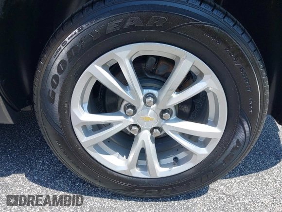 2017 Chevrolet Equinox LS with VIN 2GNFLEEK9H6305144, listed as a IAAI auction lot 42180603 with 128,433 mi miles and . Bid and sale history available at DreamBid. Image 18.