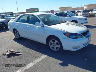 2002 Toyota Camry LE z VIN JTDBE32K320120596, wystawiony jako IAAI lot #41870188 z przebiegiem Nie podano mil oraz . Historia ofert i sprzedaży dostępna na DreamBid. Obrazek 1.