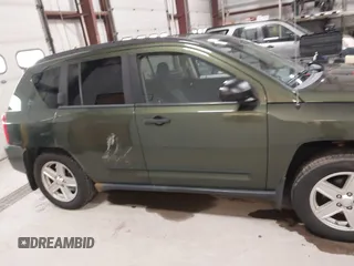 2008 Jeep Compass Sport with VIN 1J8FF47W28D534267, listed as a IAAI auction lot 42009243 with 122,720 mi miles and . Bid and sale history available at carsss.com. Image 13.